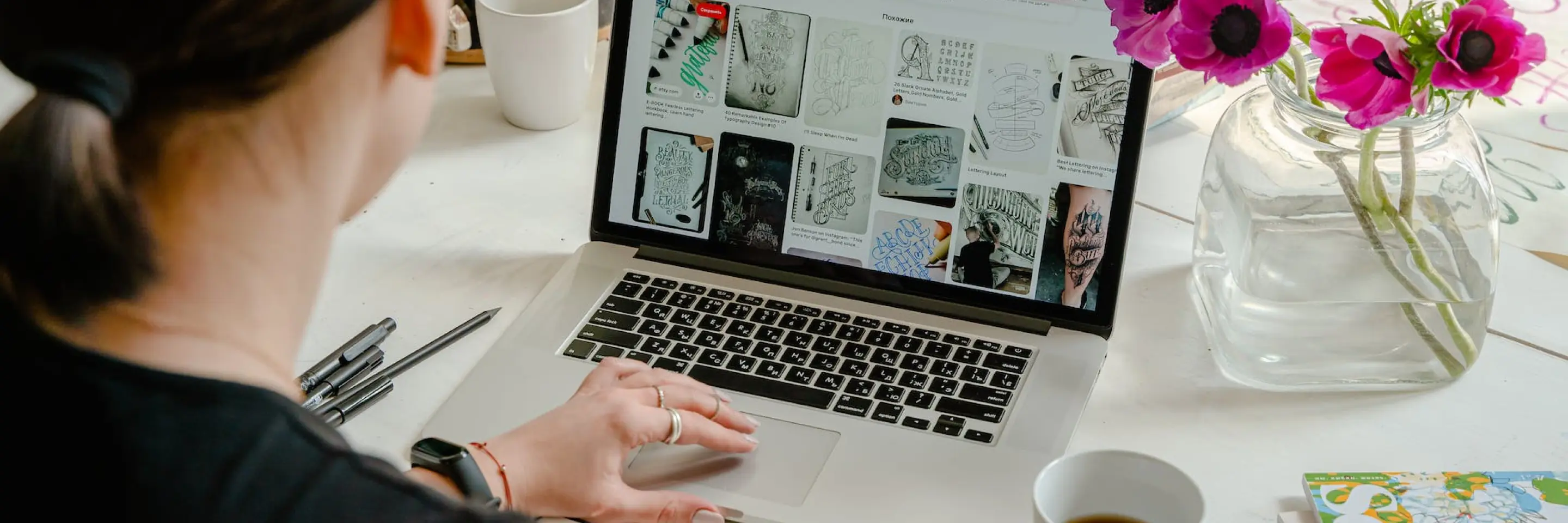 A woman browsing her laptop